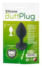 Verpackter Silikon-Analplug mit herzförmigem Schmuckstein und Größenangaben