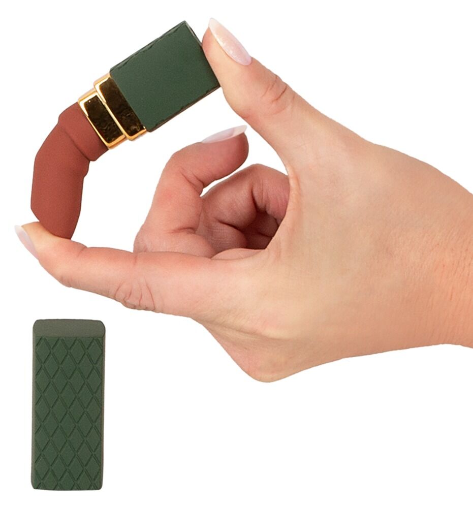 Minivibrator in Lippenstiftform, Gehäuse an Fingern gehalten; goldene Verbindungsring-Optik sichtbar