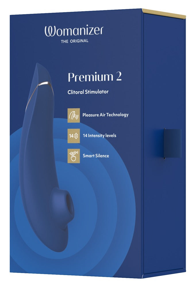 Blauer Premium-2-Karton mit Womanizer-Druckwellenstimulator-Detail auf Vorderseite