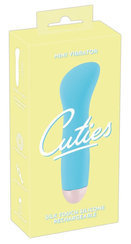 Verpackung für Cuties Mini-Vibrator, hellgelb, mit blauem Gerät im Blister
