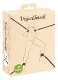 Verpackung des Bettfessel-Sets mit VEGAN Fetish Logo und Strichzeichnung
