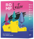 Analplug-Set auf Karton: drei Stöpsel in Pink, Türkis und Blau, Vorderseite