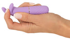 Mini-Vibrator aus Silikon, lila, mit abgerundeten Hasenohren im Handgriff