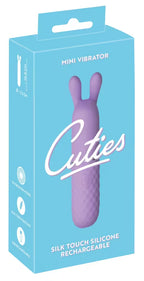 Verpackung „Cuties“ Mini-Vibrator: blaue Box mit lilaem Silikonvibrator