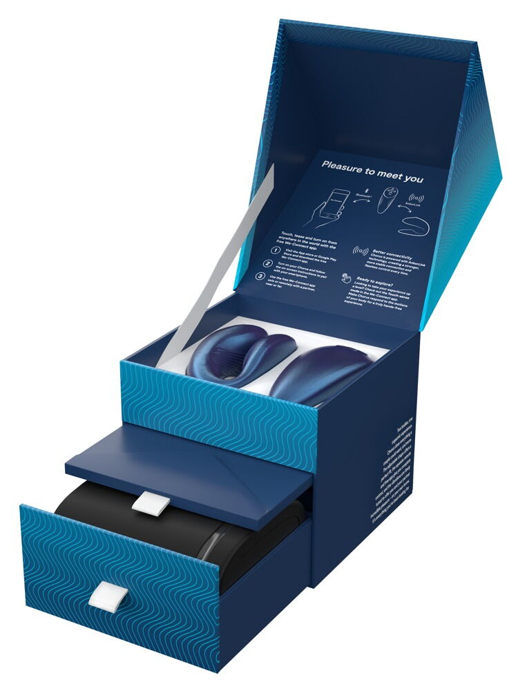 Geöffnete Verpackung des Paarvibrators in Blau mit innenliegendem Inhalt