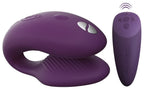 Lila Paarvibrator mit gebogener Silikonform und separatem Handteil