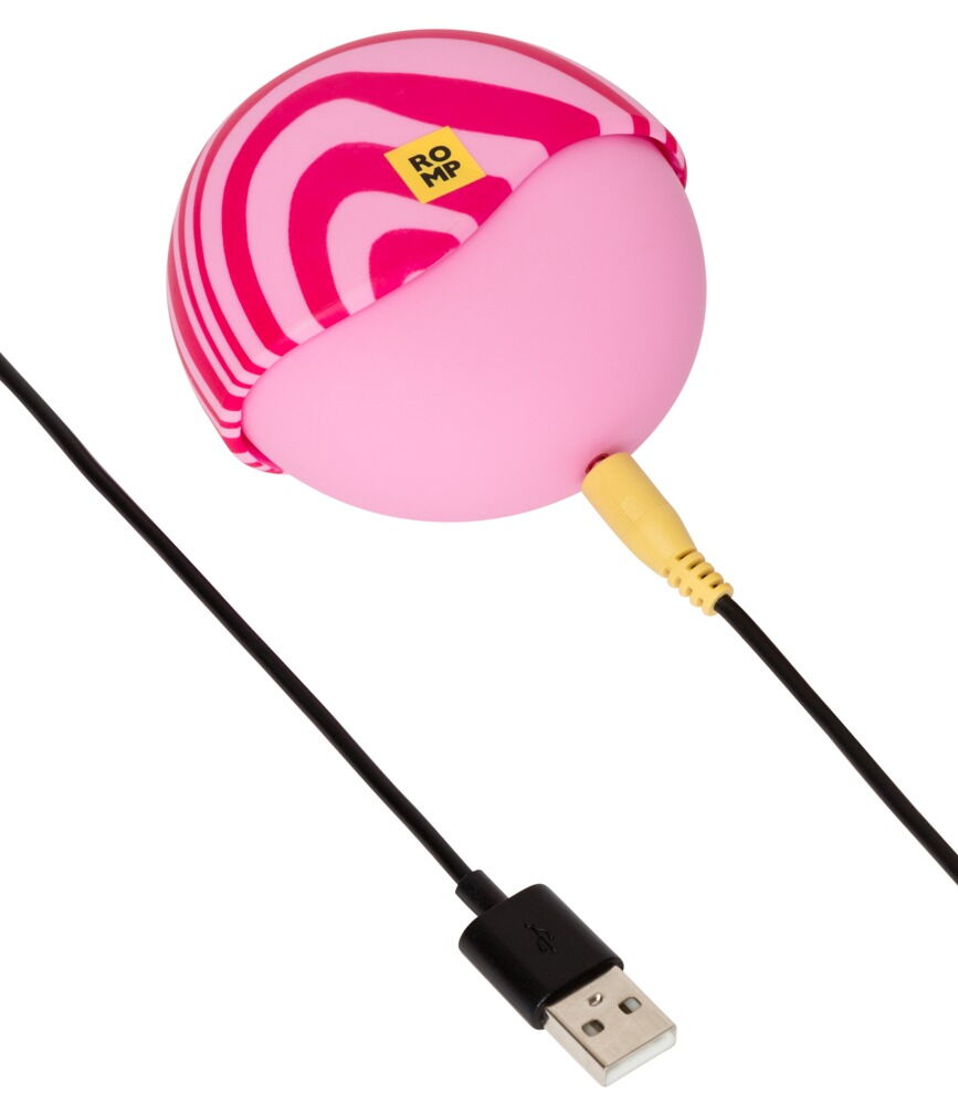 Pulsator „Spin“: pinkes Gerät mit Ringmuster und angeschlossenem USB-Stecker