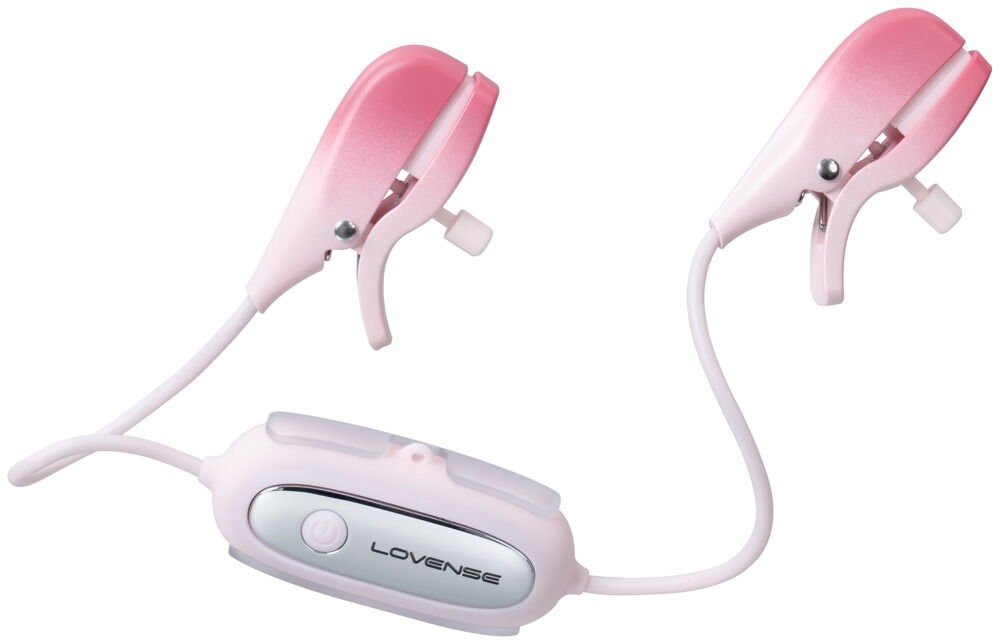 Vibrations-Nippelklemmen mit pinken Clip-Haltern und weißem Kabel, kompakte Steuereinheit