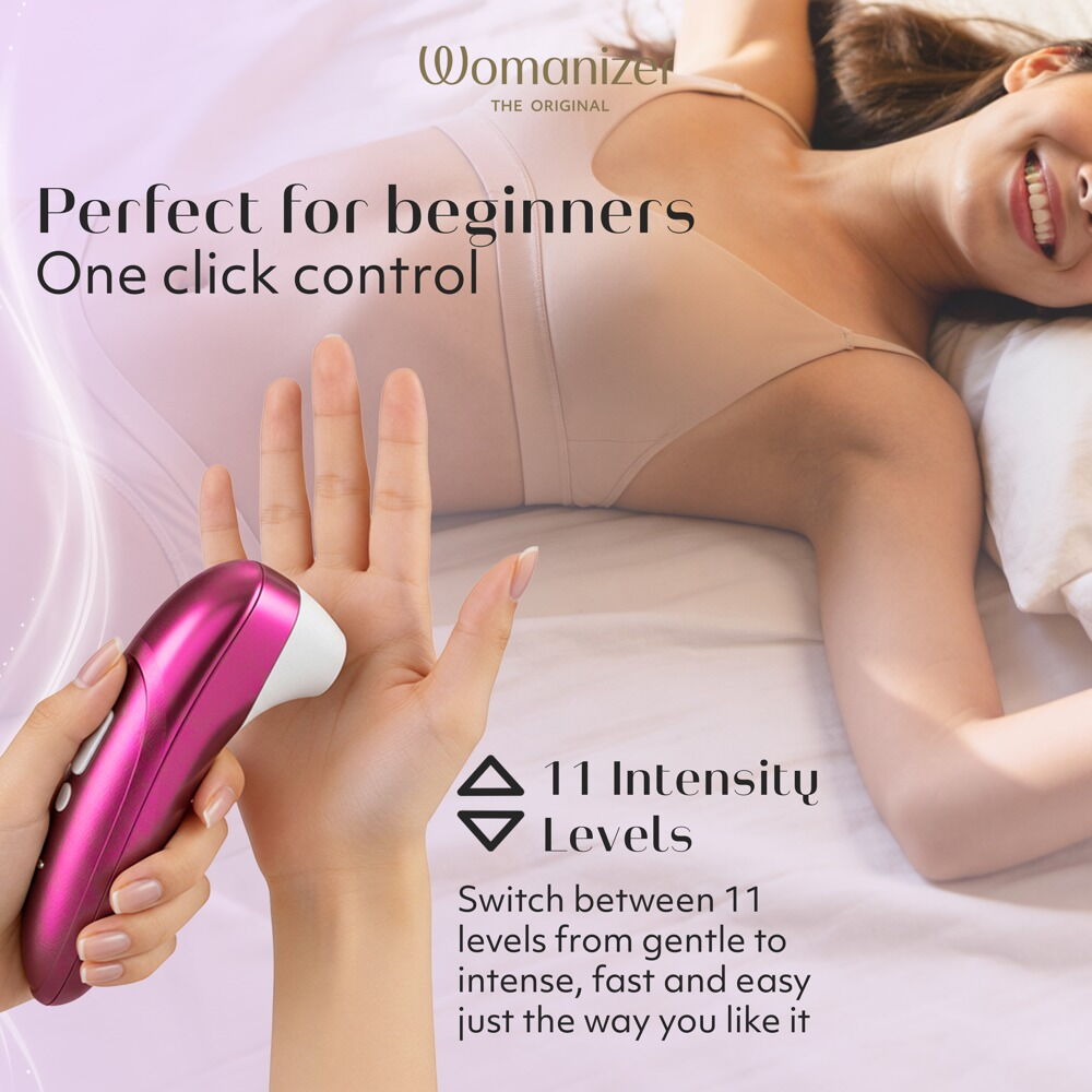 Womanizer PRO Klitorisstimulator, pinkes Handgerät mit weißem Aufsatz