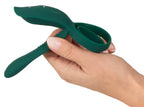 Grüner Silikon-Vibrator mit Ringform, in Hand gehalten