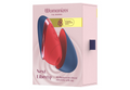 Verpackung Womanizer Next Liberty mit blau- und rotfarbenem Gerät.