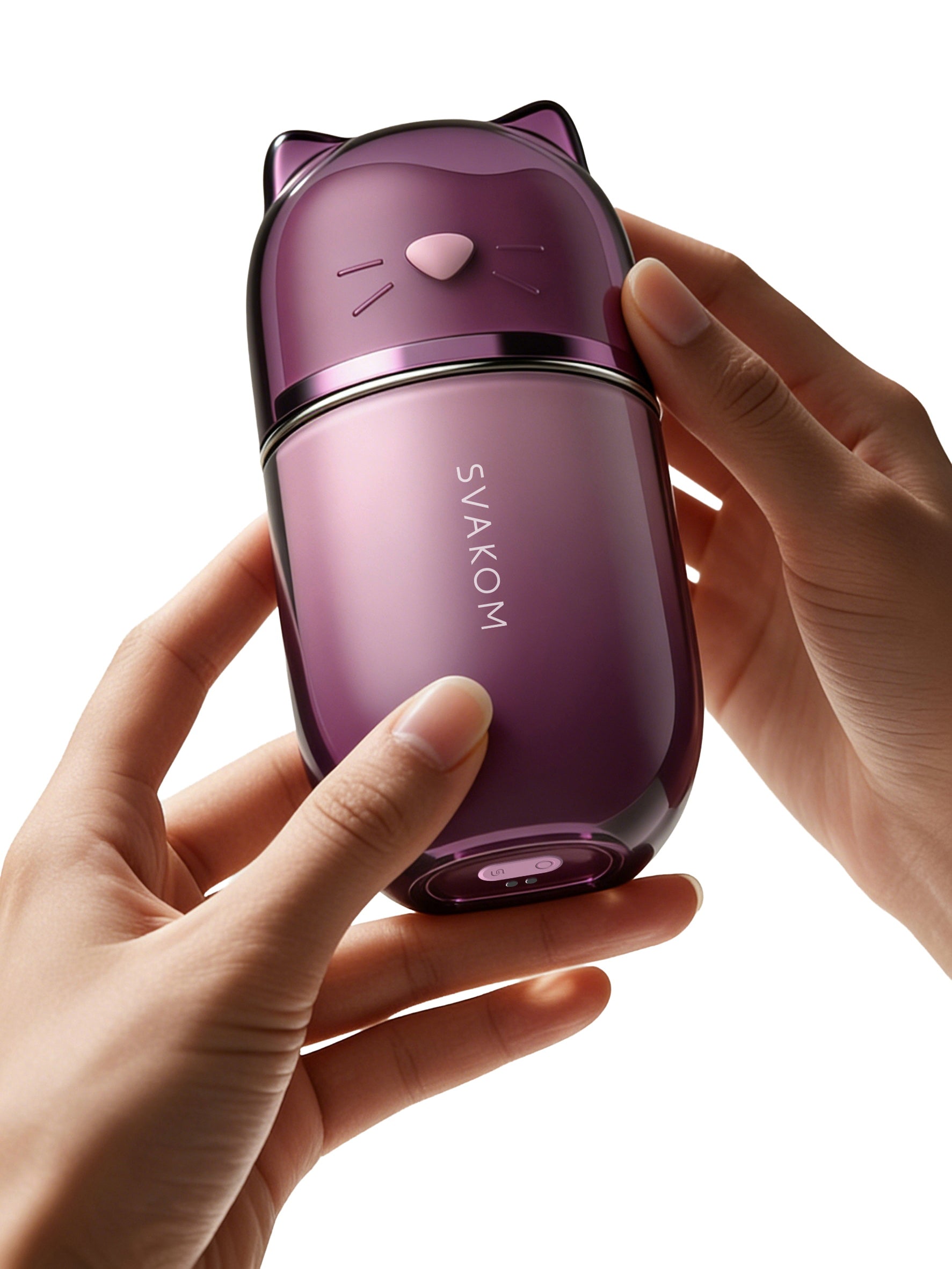 Auflegevibrator mit Saug- und Leckfunktion, violett-rosa Gehäuse mit Katzenkopf