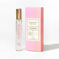 Love in Bloom Duftroller „Sunny Daze“: Glasflasche mit Goldkappe, rosa Umverpackung