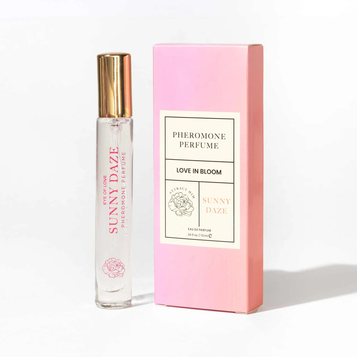 Love in Bloom Duftroller „Sunny Daze“: Glasflasche mit Goldkappe, rosa Umverpackung